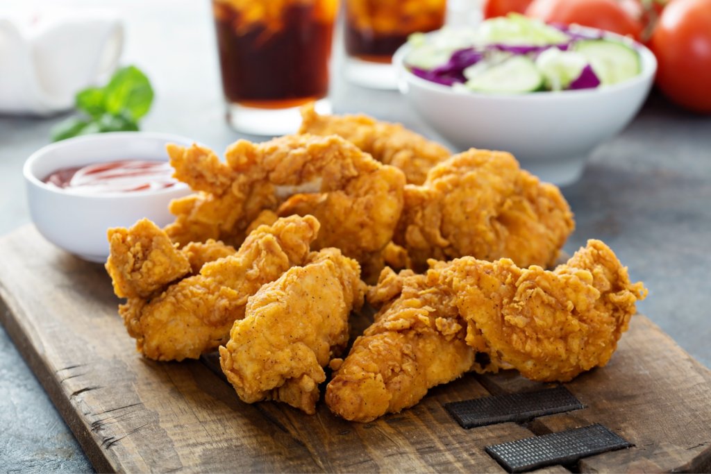 Chicken tenders on cutting board