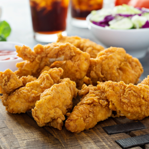 Chicken tenders on cutting board